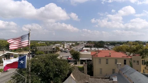 4K Drone Texas Flag Pass By Fredericksburg Texas Stock Footage 118398294