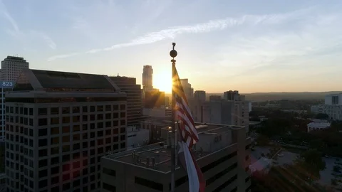 4K Drone Texas Flag US Flag at Sunset Stock Footage 97864404