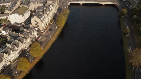 4K Drone Tilt Up and Push Forward Over River Ness with Inverness in View Stock-Footage 285534464
