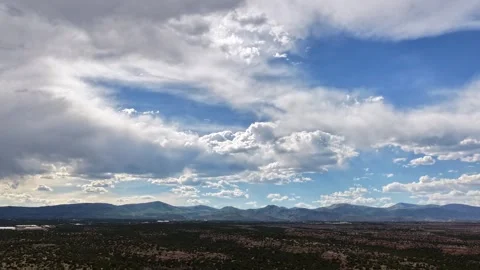 4K Drone Timelapse: Diverse Cloud Types Shifting Over Desert Mesas Stock Footage 338166762