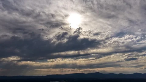 4K Drone Timelapse: Dramatic Sun Rays Piercing Heavy Clouds Stock Footage 339838990