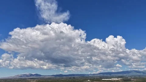 4K Drone Timelapse: Fast Shifting Clouds Over Mesa And Mountains Stock Footage 338132358