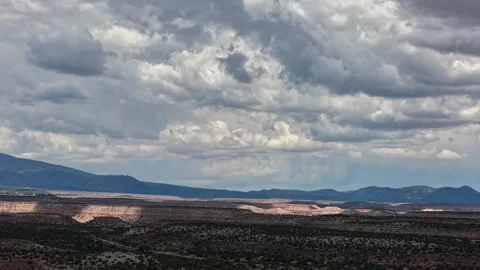 4K Drone Timelapse Of Heavy Clouds And Swift Shadows Over Vast Mesas Stock Footage 340927658