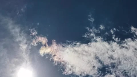 4K Drone Timelapse Of Iridescent Clouds In A Deep Blue Sky Stock Footage 344091060