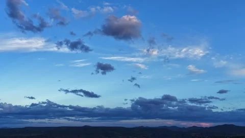 4K Drone Timelapse Of Last Evening Light Waving Over Fluffy Cloud Stock Footage 342877926