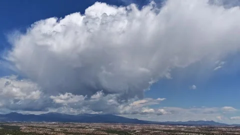 4K Drone Timelapse: Massive Misty Cloud Morphing Over Desert Mesas Stock Footage 338132728