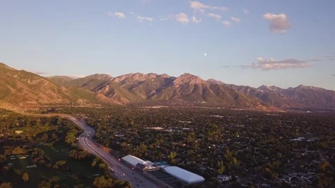 4K Drone Timelapse over the top of Utah Suburbs and Highway Stock Footage 249027192