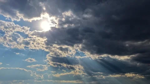 4K Drone Timelapse Of Radiant Sun Beams And Incoming Storm Clouds Stock Footage 340337975