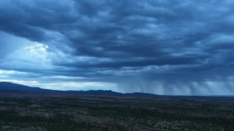4K Drone Timelapse Of Rain Moving Over Vast Mesa During Blue Hour Stock Footage 341082494