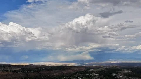 4K Drone Timelapse Of Rainclouds And Distant Wildfire Smoke Видео 344951396