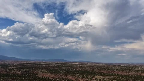 4K Drone Timelapse Rising Over Vast Mesa And Fast Moving Storm Clouds Stock Footage 340266852