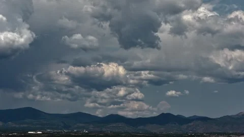 4K Drone Timelapse: Stormy Cloud Layers Forming Over Mountains Stock Footage 339836557
