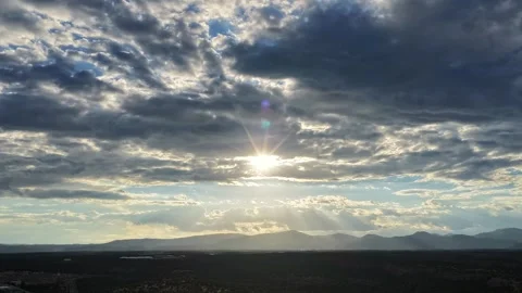 4K Drone Timelapse Of Sun Breaking Through Clouds Over Mountains Stock Footage 341082468