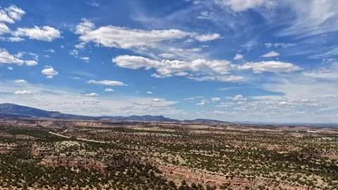 4K Drone Timelapse of Swift Cloud Shadows Moving Across Desert Mesas and a Stock Footage 335921174