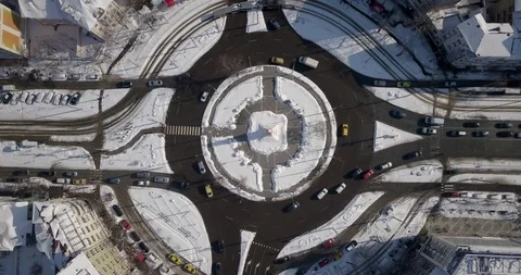 4K Drone Top Down shot of city roundabout Stock Footage