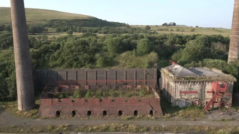 4K Drone Tracking of Historic Waterside Ironworks Ruins, Dalmellington, Scotland Stock Footage 340003378