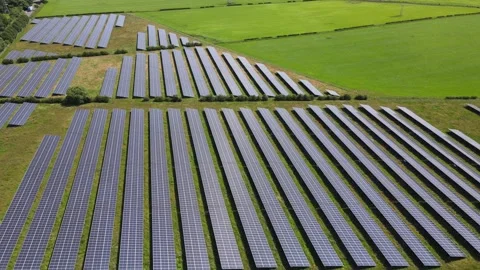 4K Drone Tracking Over Large Solar Farm in Rural UK Stock Footage 337696465