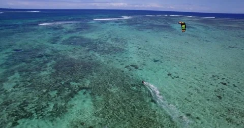 4K Drone Tracking Shot Of Kite Surfer In Mauritius. Stock Footage 66775158