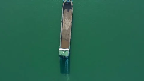 4K Drone Video of Boat Navigating Backlit River Stock Footage 319611972