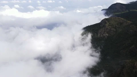4k Drone video of clouds hovering hills in Ooty, India Stock Footage 148365278