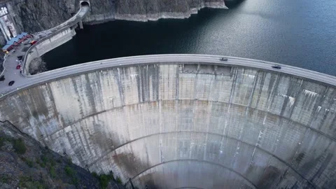 4k Drone Video / Epic Dam Reveal Video / Pan Motion In The Mountains Video stock 231905314