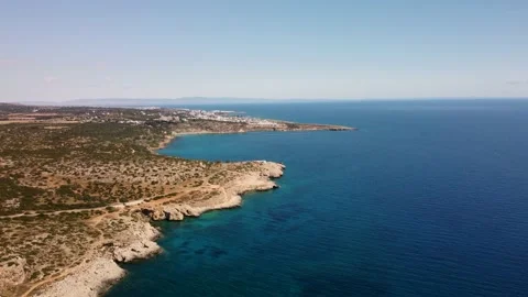 4K drone video flying over the coastline with crystal clear waters and rocks Stock Footage 236792387