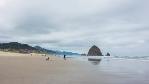 4K Drone Video of Haystack Rock in Oregon Rising from Pacific Waters at Cannon B Video stock 309280212