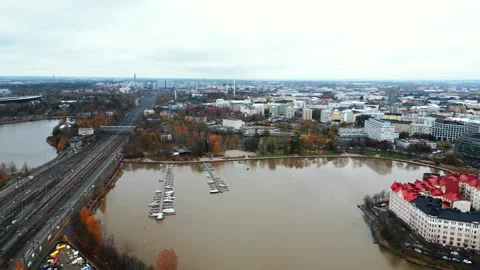 4K drone video of river flowing in coastal town of Helsinki Finland Stock Footage 257936055