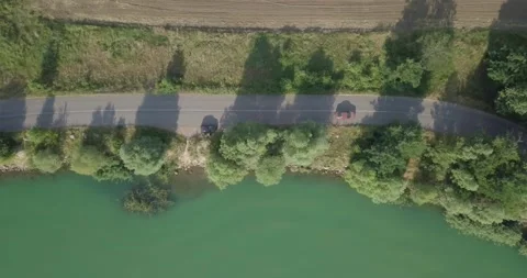 4K Drone video of Road topdown with tractor and car Stock Footage 167853534