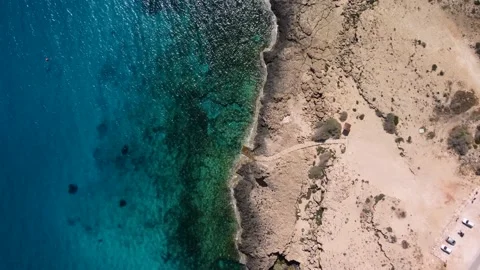 4K drone video, top view of the coastline with crystal clear waters and rocks Stock Footage 236792292