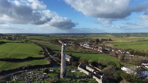 4K drone view of Ardmore Round Tower in County Waterford Stock Footage 333707626