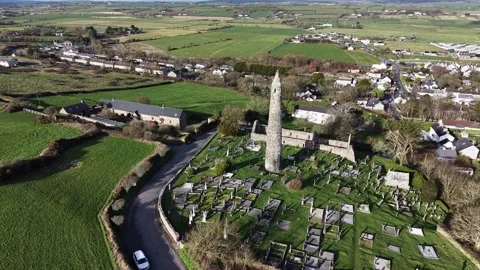 4K drone view of Ardmore Round Tower in County Waterford Stock Footage 333707629
