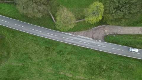 4K drone view of a Car on road - top down view Stock Footage 255749427