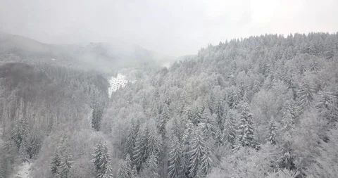 4K Drone view in cloudy and snowy mountains8 Stock Footage 125765124