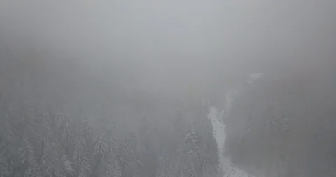 4K Drone view in cloudy and snowy mountains7 Stock Footage 125765197