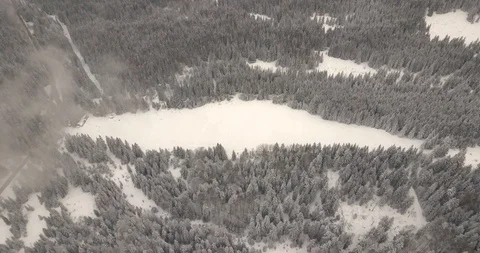 4K Drone view in cloudy and snowy mountains5 Stock Footage 125765570