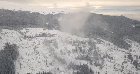 4K Drone view in cloudy and snowy mountains4 Video stock 125765650