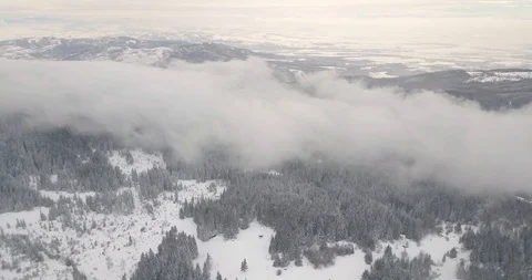 4K Drone view in cloudy and snowy mountains3 Stock Footage 125765838