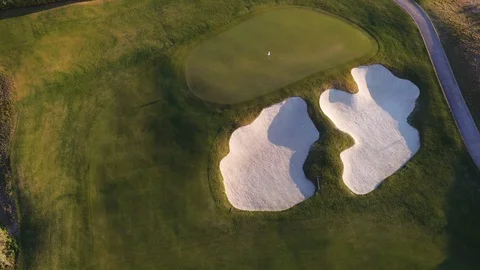 4K drone view flying backwards at sunrise Trump National LA golf course Stock Footage 89643082