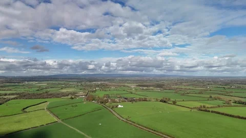 4K drone view of green rural fields and farmland Stock Footage 333707607