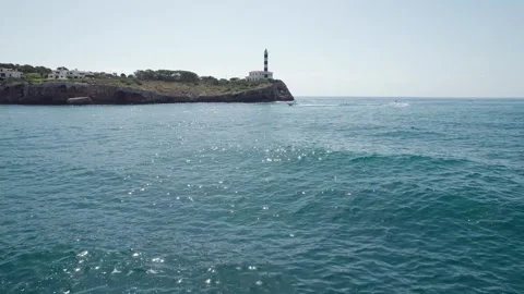 4k drone view of inside cave, view Lighthouse Portocolom in Mallorca. Stock Footage 246533397