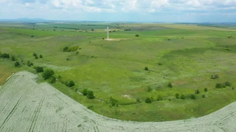 4K Drone view. A large sculptural structure of a Christian cross in the Balkans Stock Footage 243156407
