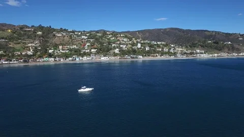 4K drone view of ocean and shoreline in Malibu, California Stock Footage 71475415
