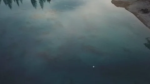 4K Drone View over Mountain lake in autumn, winter with snow and forest and way 스톡 동영상 90773370