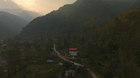 4K drone view, pristine river winding, Himalayan mountains of Sikkim Stock Footage 341972522