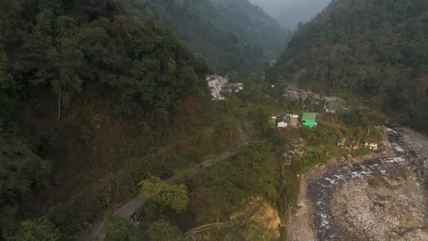 4K drone view, pristine river winding, Himalayan mountains of Sikkim, India. Stock Footage 341974437
