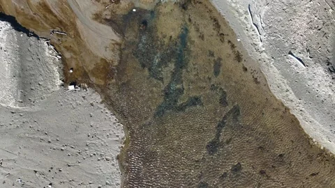 4k drone view of small river over the beach Stock Footage 291398852