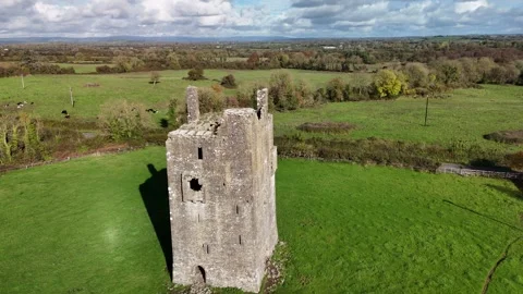 4K drone view of stone tower ruin in Ballagharahin Stock Footage 333707507