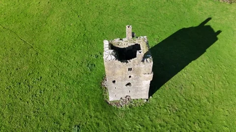 4K drone view of stone tower ruin in Ballagharahin Stock Footage 333707509