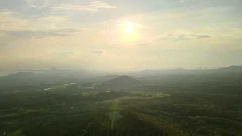 4K Drone View of Sunset over Hills on a Slope of Hallasan, Jeju Island Stock Footage 143863369